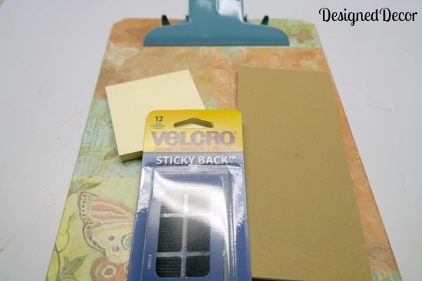 using velcro to stick on the note pads