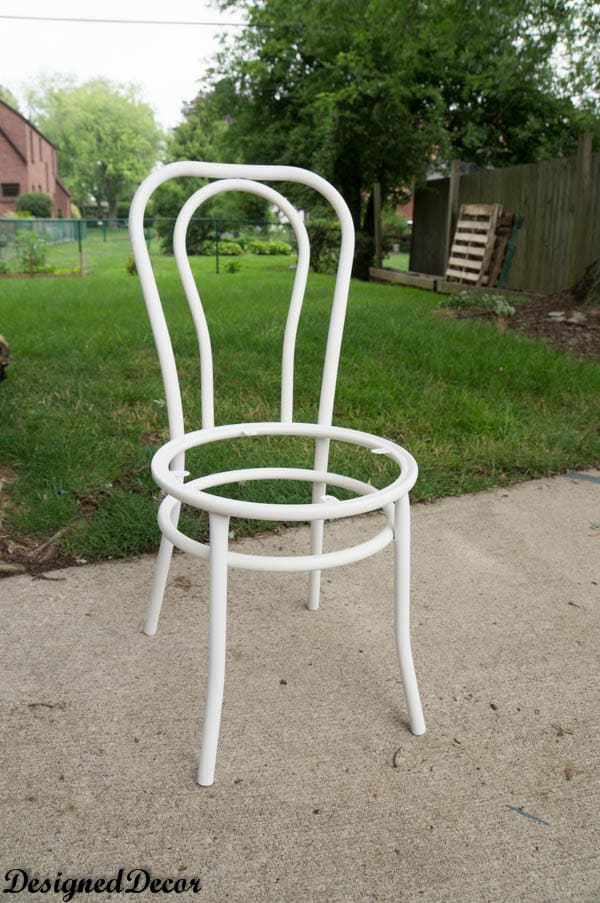 metal chairs after spraying on primer