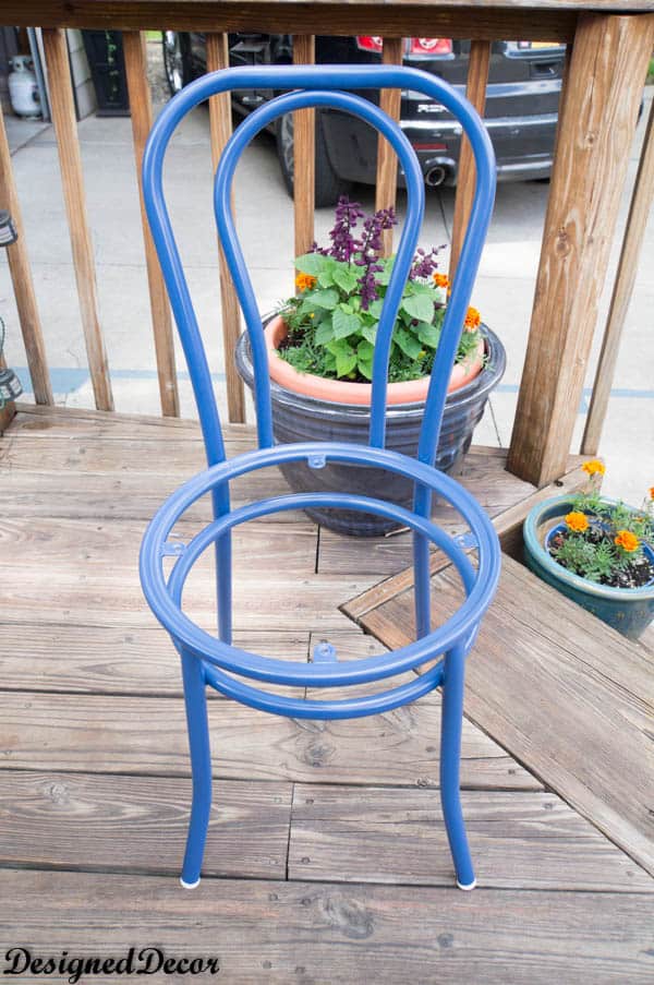 Blue Spray painted metal patio chair 