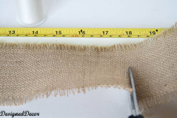 cutting and measuring the burlap for flowers