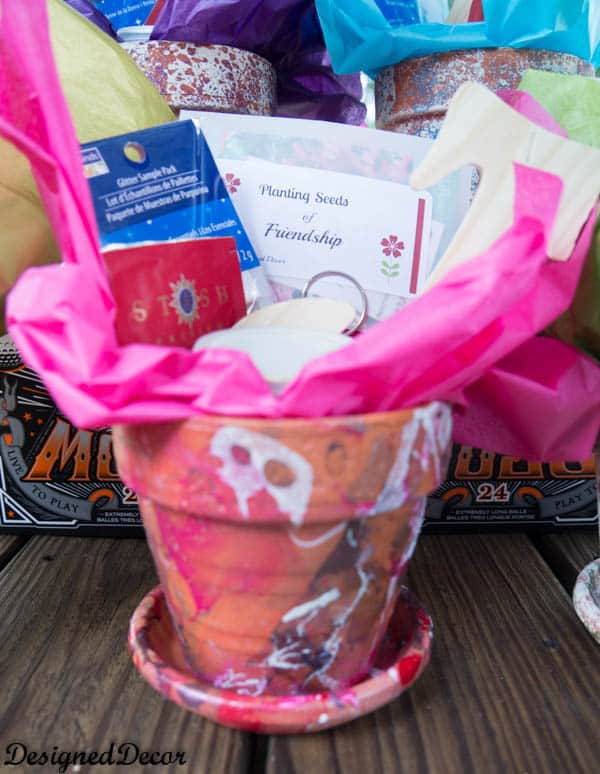 painting flower clay pots with nail polish