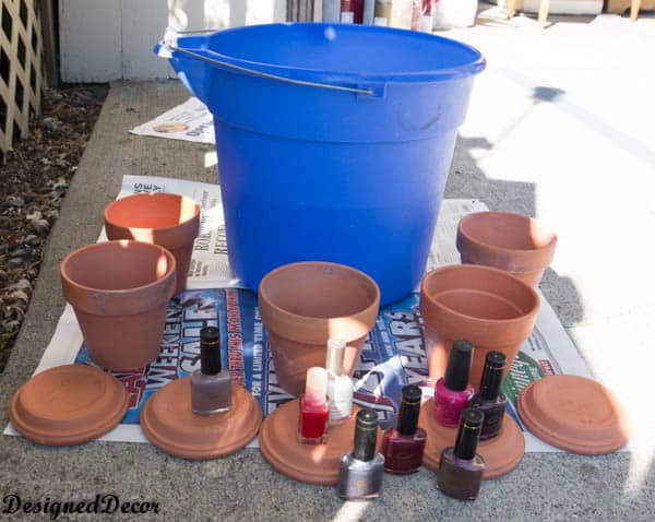  painting flower clay pots with nail polish