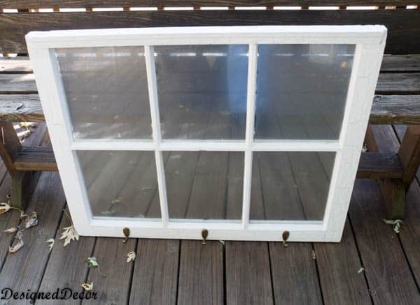 repurposed wood window into a coat rack