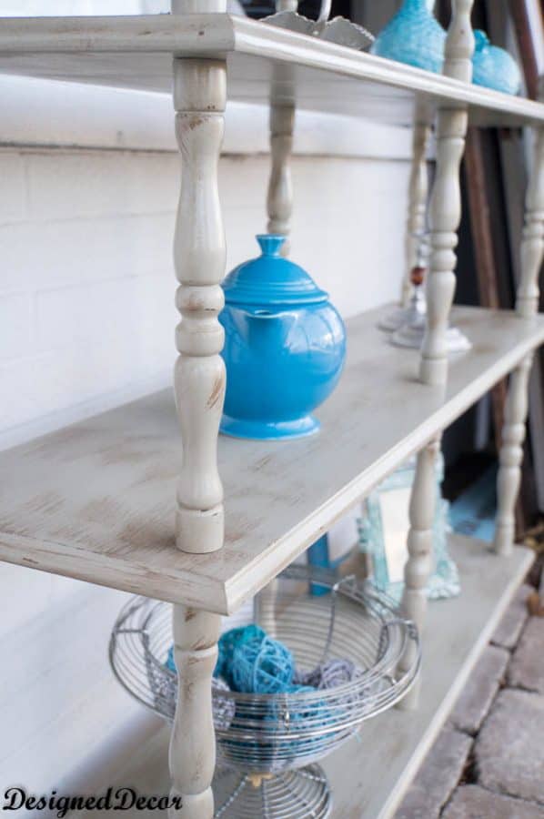 Image of a 3 tier shelf painted with light gray DIY chalk paint