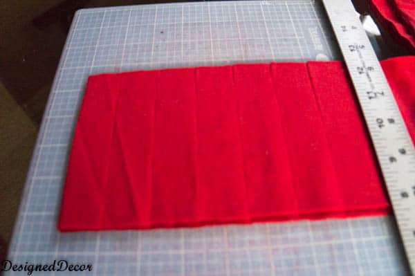 cutting strips for a Repurposed T-Shirt Rug-