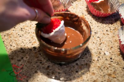 Dipping Strawberries into Chocolate