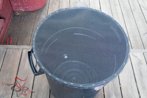 attaching screen for DIY Rain Barrel ~ Tutorial-