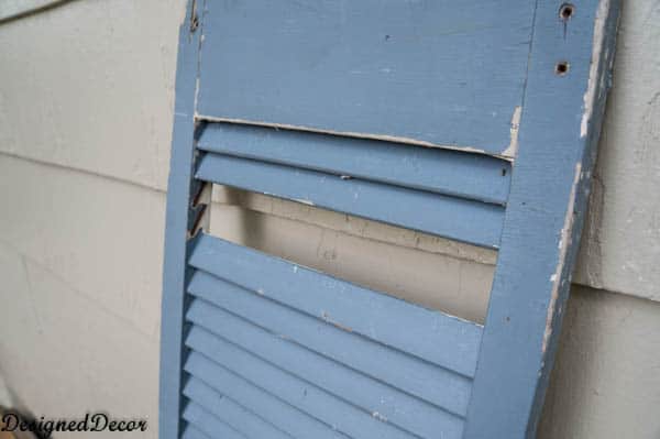 repairing a shutter with paint sticks-2-2