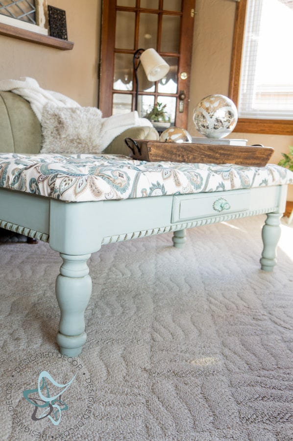 White tufted store coffee table