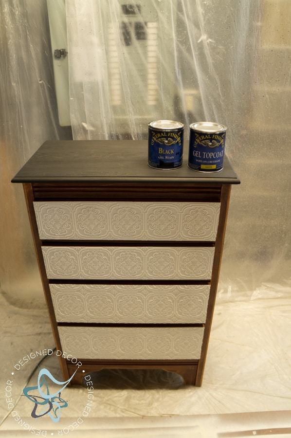 dresser with paintable wallpaper on drawers