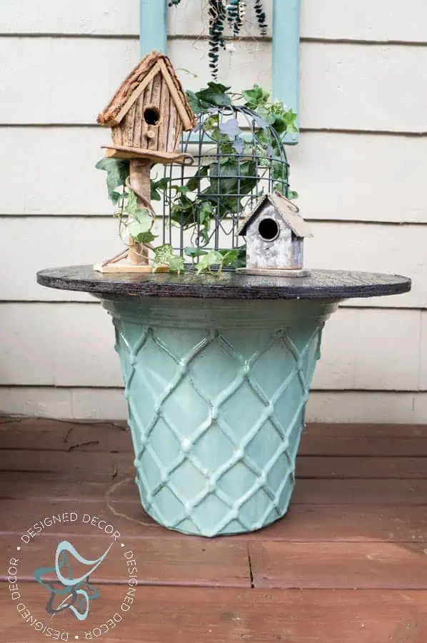 Repurposed-Electric-Spool-Table-- #marshallssurprise - ceramic-planter- www.designeddecor.com Repurposed-Electric-Spool-Table-
