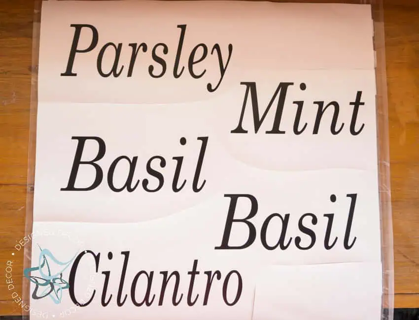 Vertical-Herb-Garden-Repurposed-Ladder-Silhouette-Cameo making labels with a Cameo vinyl cutter