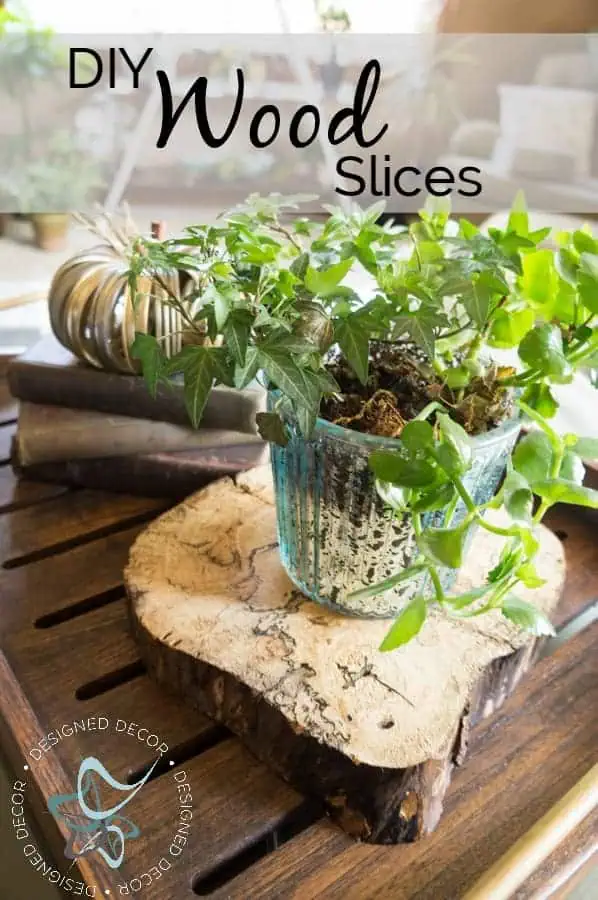 Make your own DIY Wood Slices. They look great under plants or candles for the perfect home decor accent- www.designeddecor.com diy-wood-slices-natural-rustic-centerpiece-home-decoaccessories-pinnable