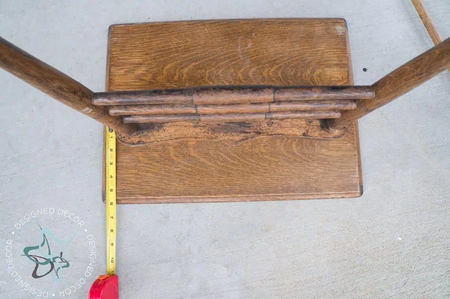 measure and cut an old piece of wood for shelves Repurposed Chair Shelf-Towel Holder--1