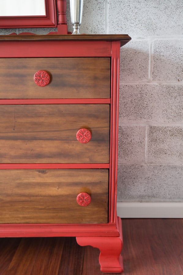 close up image of a stained and painted dresser 
