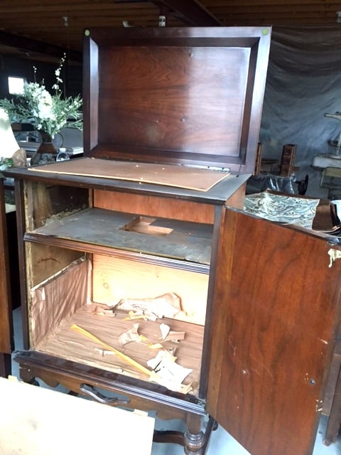 inside of an antique radio cabinet  