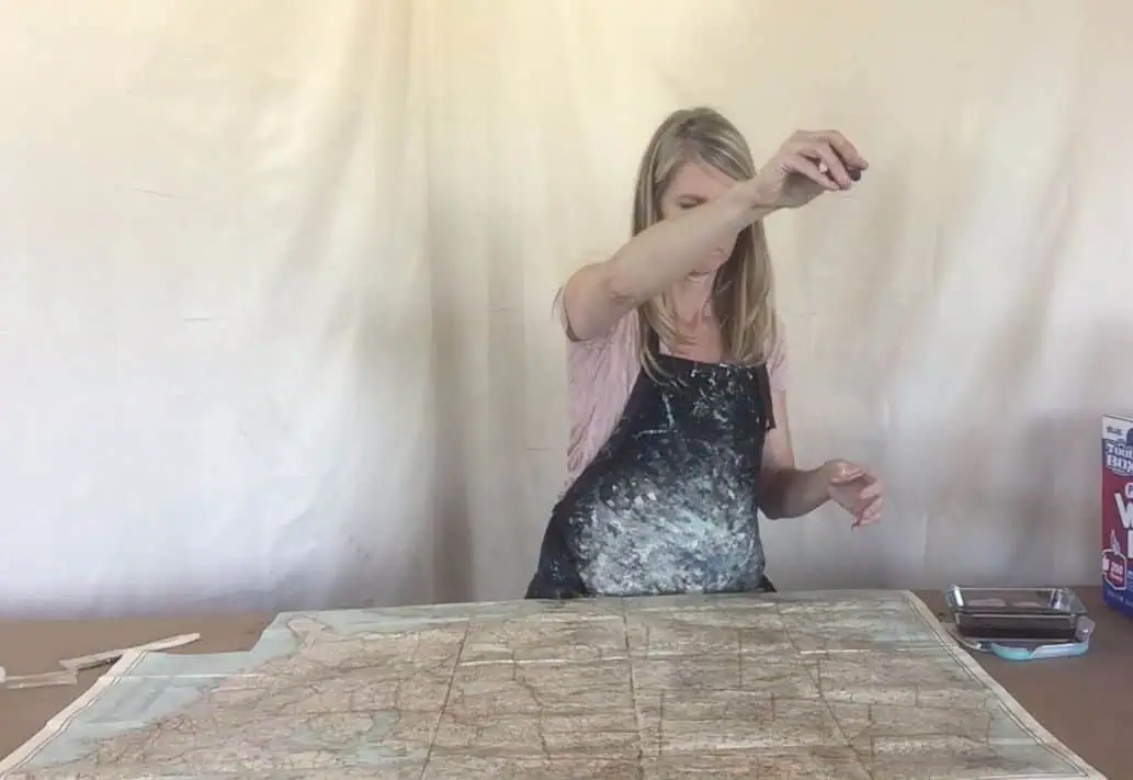 tea stain a map to give an antique appearance