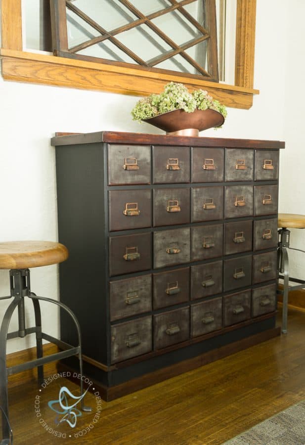 antique apothecary cabinet makeover in a dining room