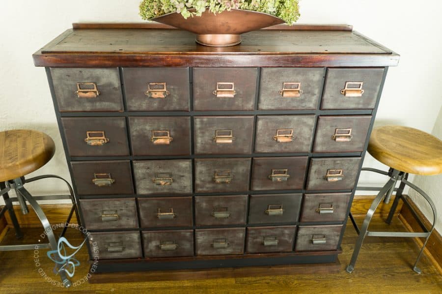 Front view of antique apothecary cabinet