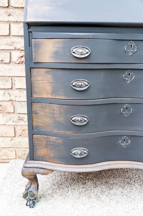 Black painted dresser with Naturally distressed edges.