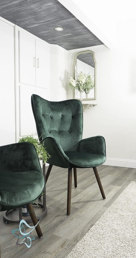 Modern green velvet wingback chair