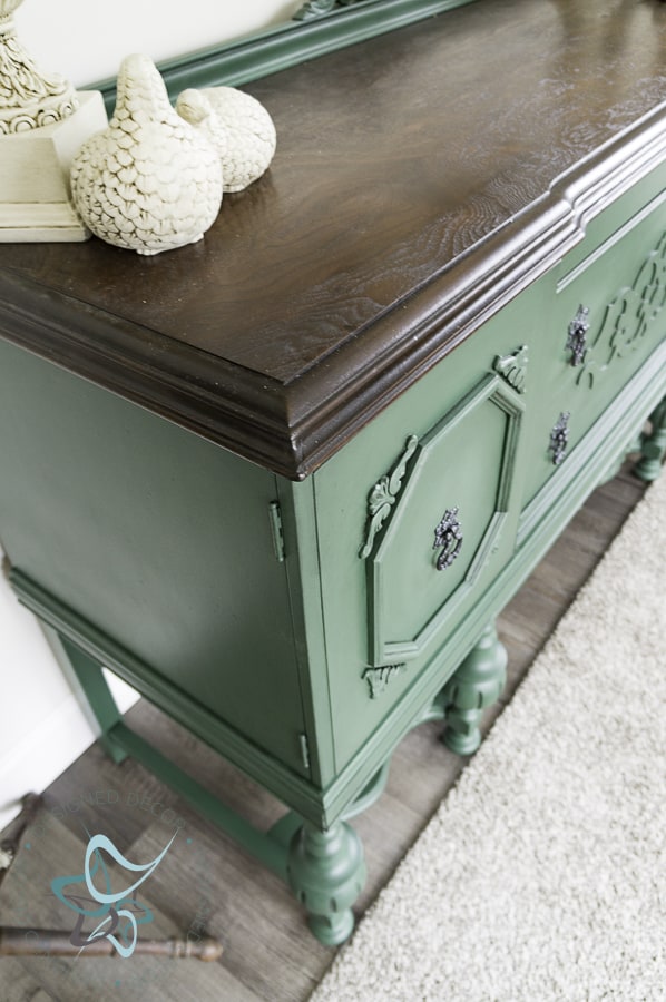 antique buffet with stain top and green painted base