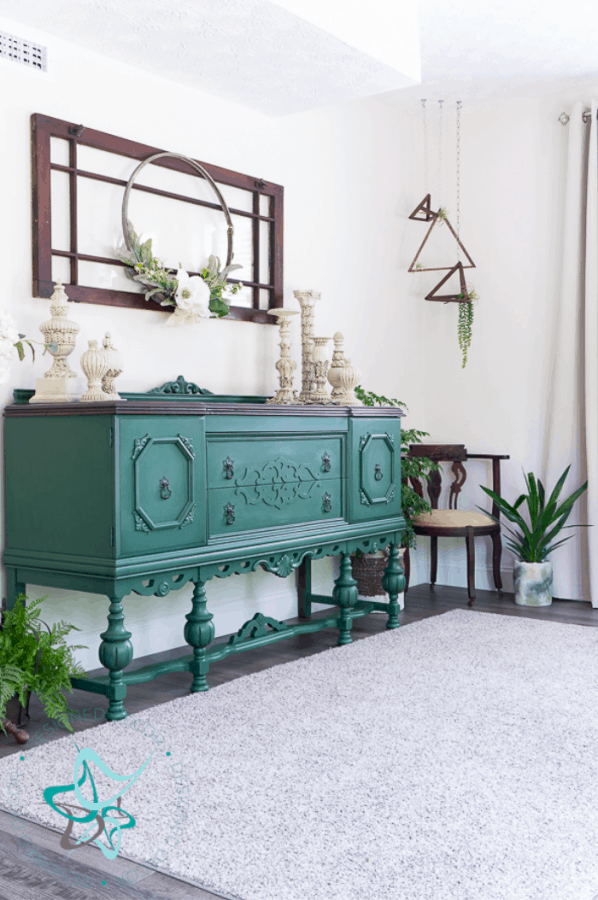 antique buffet painted in a custom dark green chalk paint