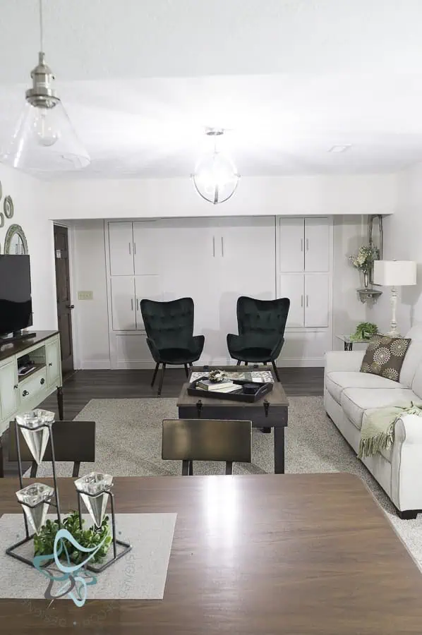 Sitting Area by day- Murphy bed by night