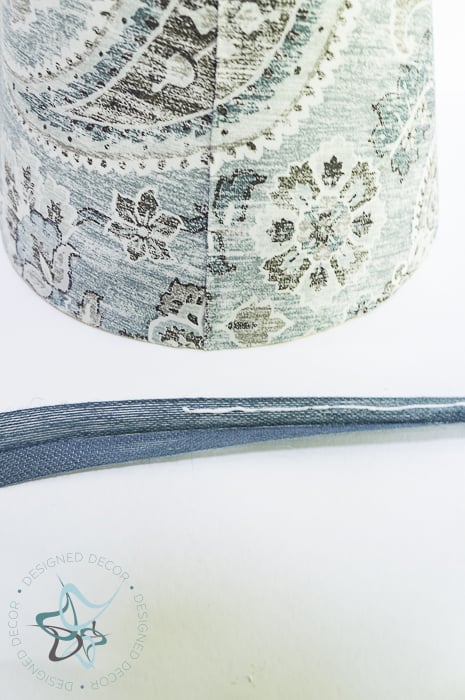 use fabric glue to secure folded ribbon