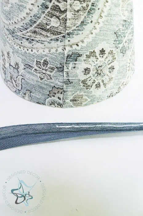 use fabric glue to secure folded ribbon