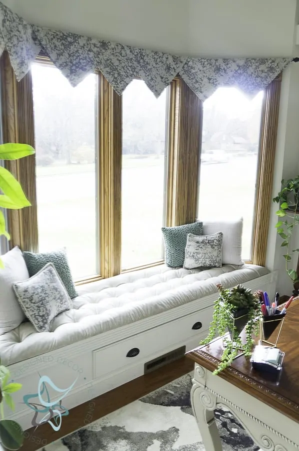 Amazing Budget-Friendly Home Office Makeover view of bay window with a built in bench seat