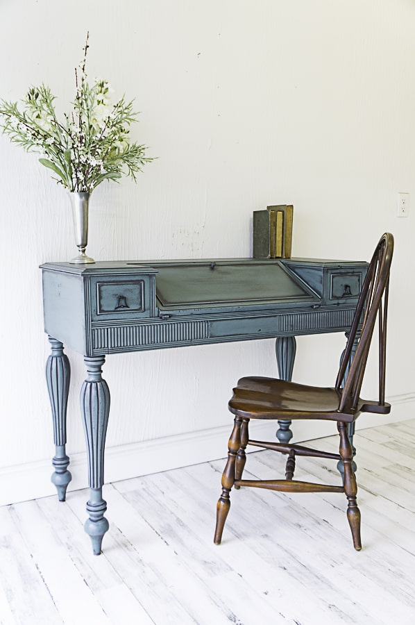 blue painted desk with powder glazing and an antique chair