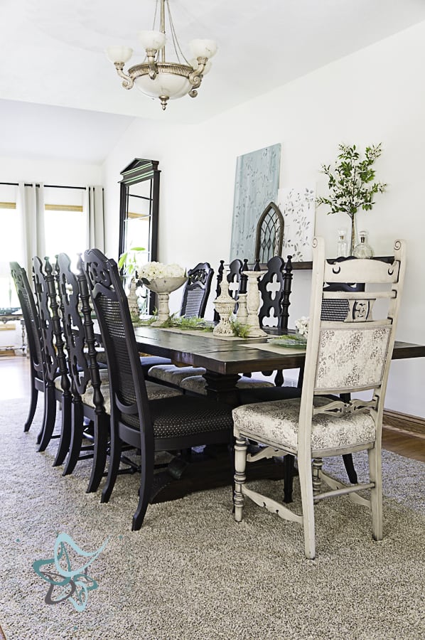 Aarhus trestle dining table with antique chairs painted in black