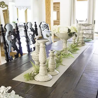 Dining table with antique, vintage, and modern touches.