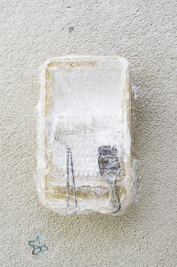 image of a paint tray wrapped with plastic wrap