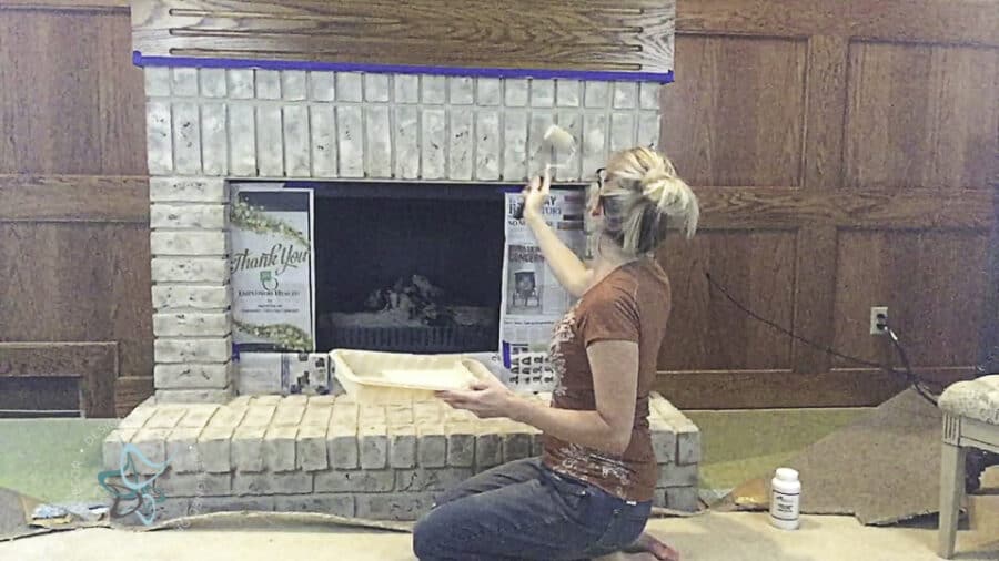 image of painting bricks on a fireplace