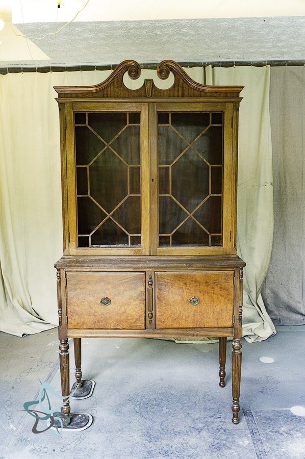 image of vintage china hutch with glass doors