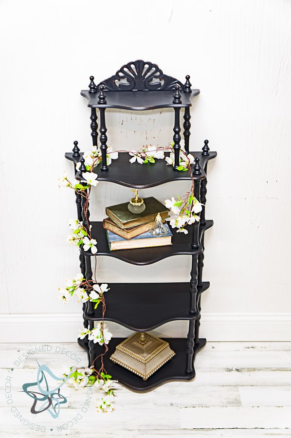 image of a 5 tier spindle shelf painted in black