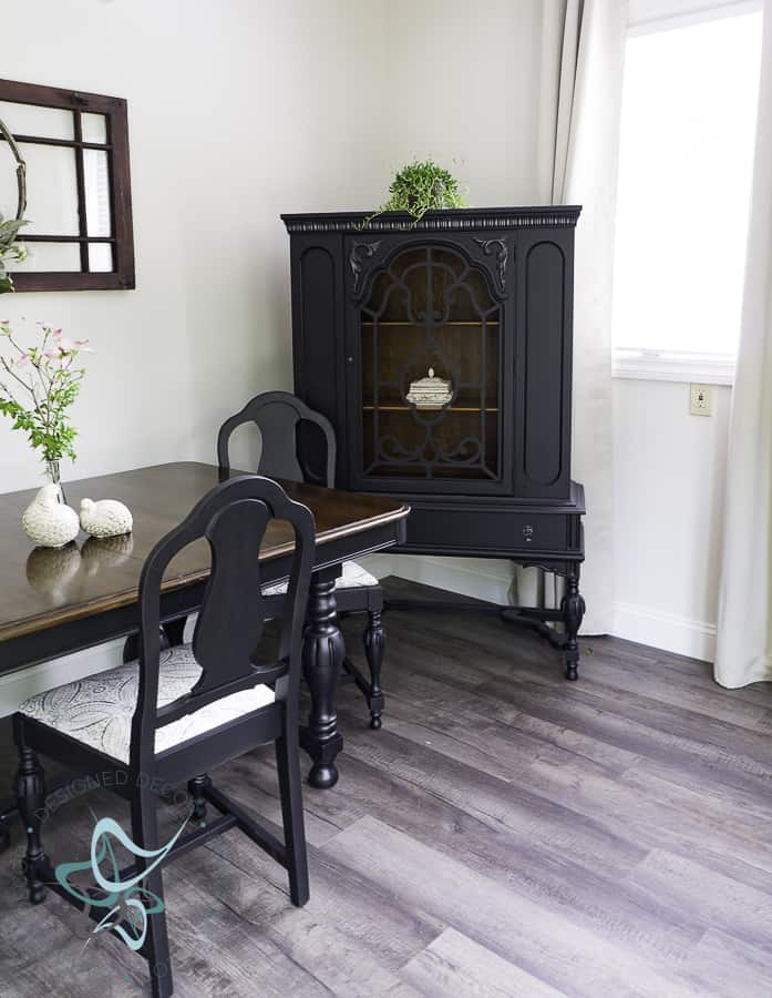 image of a black painted antique china hutch and dining table