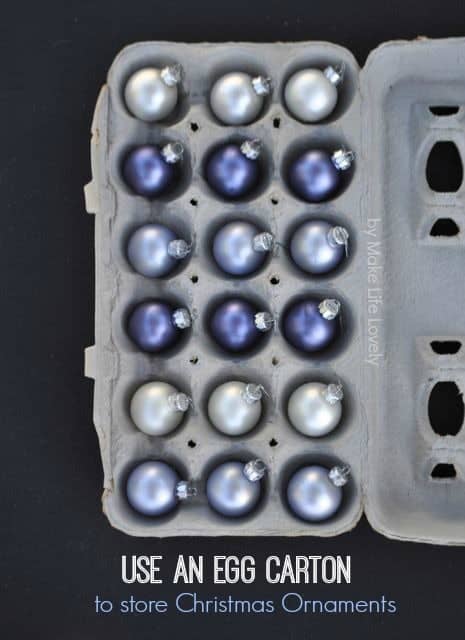 blue Christmas bulbs in an egg carton