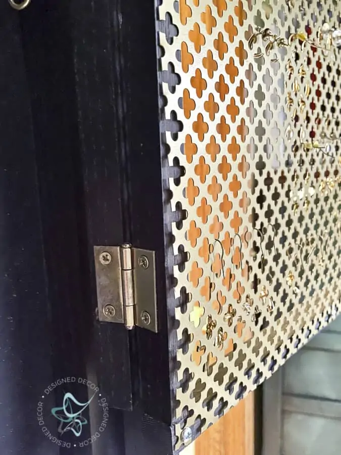 close up image of gold door hinges 