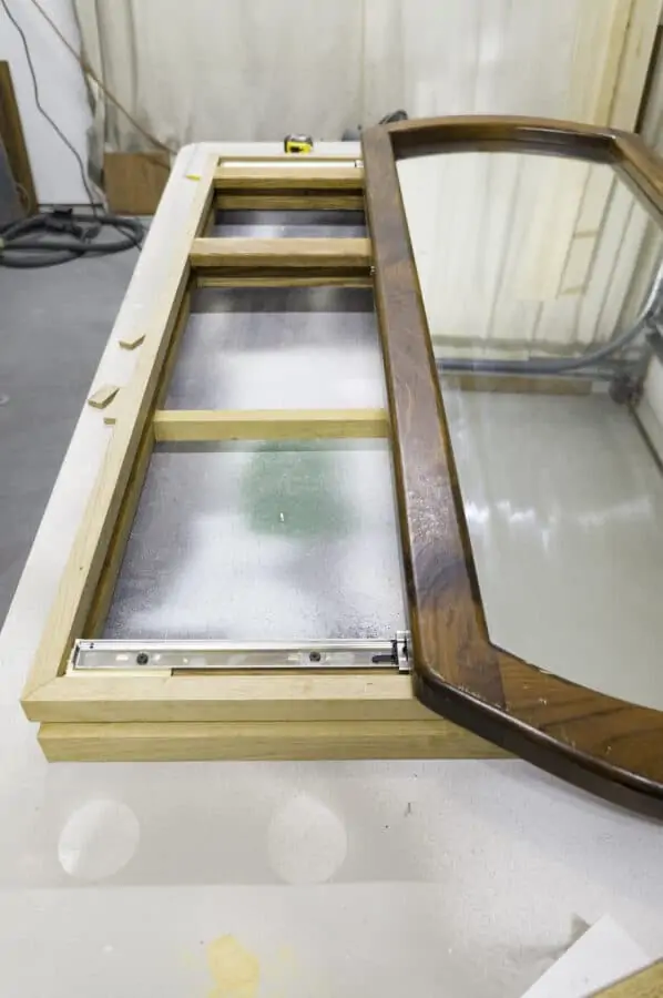 front view of the sliding mirror jewelry cabinet before it is painted