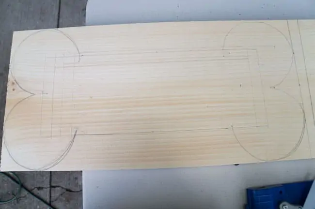 sketched bone on a piece of wood