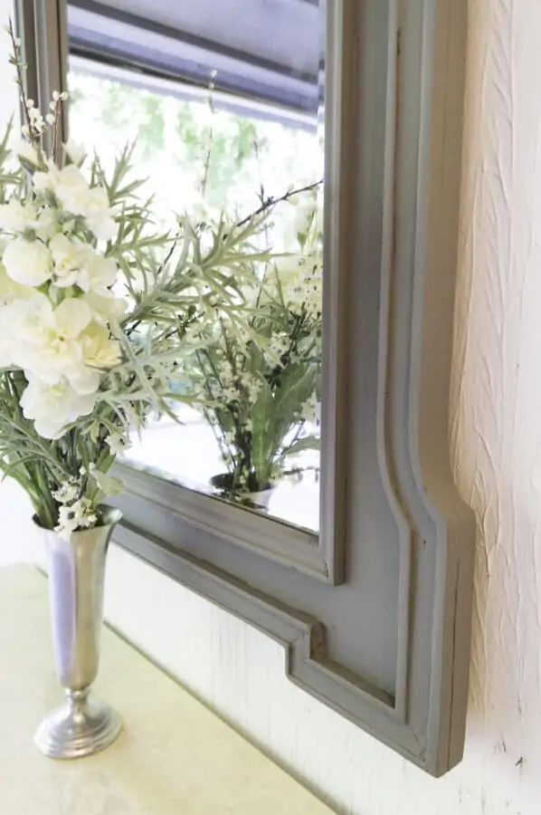 close up image of a painted mirror frame