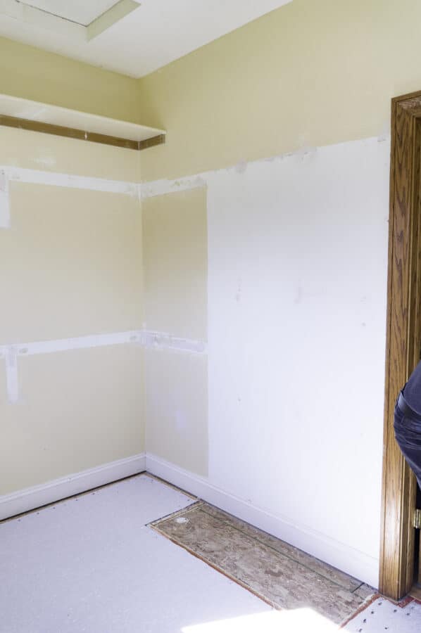 image of an empty closet after removing the shelves