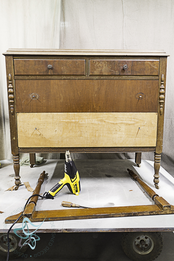 antique 4 drawer dresser with missing veneer on bottom drawer