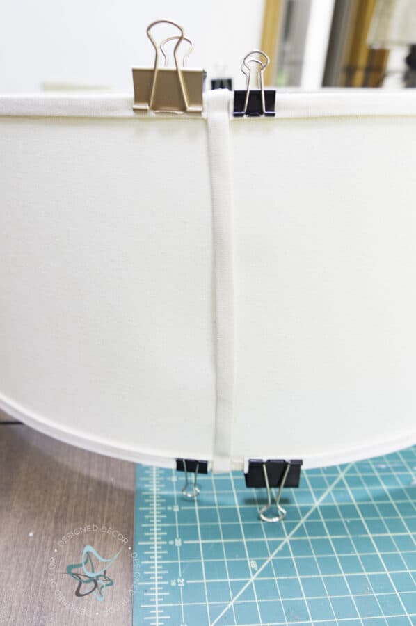 binder clips holding lampshade together while drying