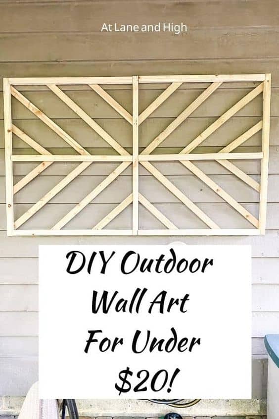 diy wood wall art hanging on the side of a house