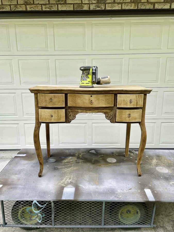 entryway table after sanding off finish