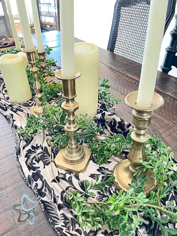 dining tablescape using a scarf and candles